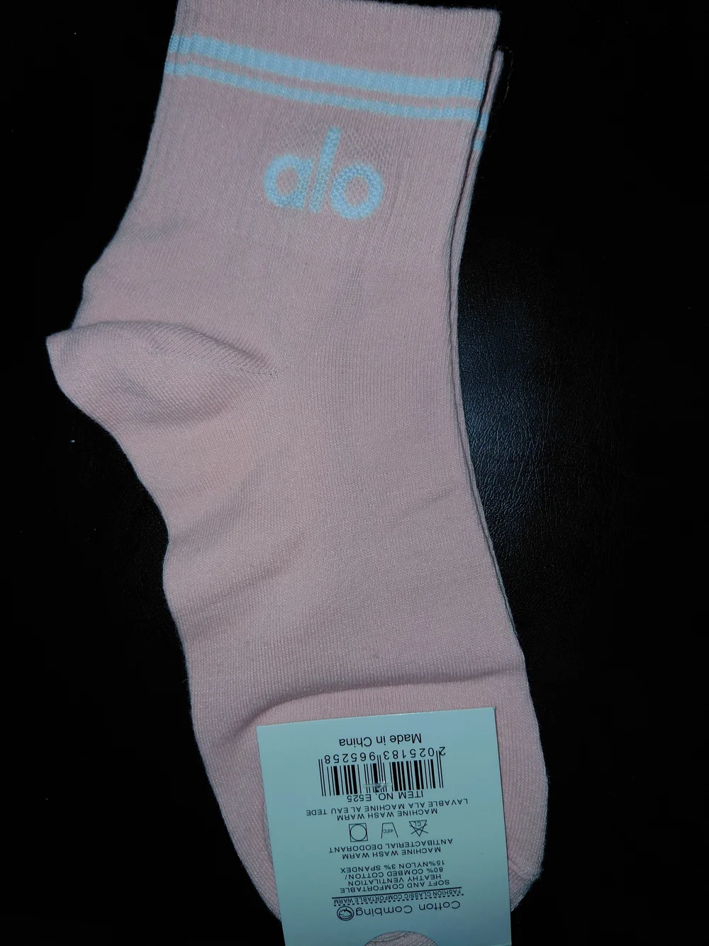 ALO Yoga Unisex Crew Socks in Blush Pink with Light Blue Accent
